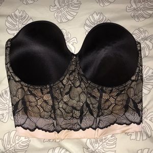 Strapless, low back, black bra.